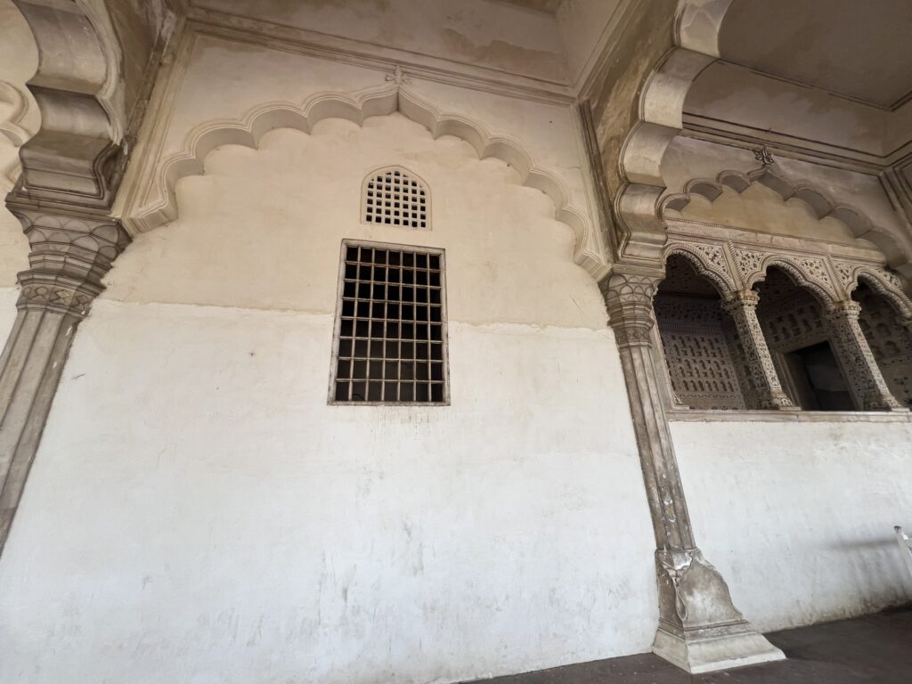 The marble lattice-work scree behind which the women of the harem sat, while court was in session in Mughal India