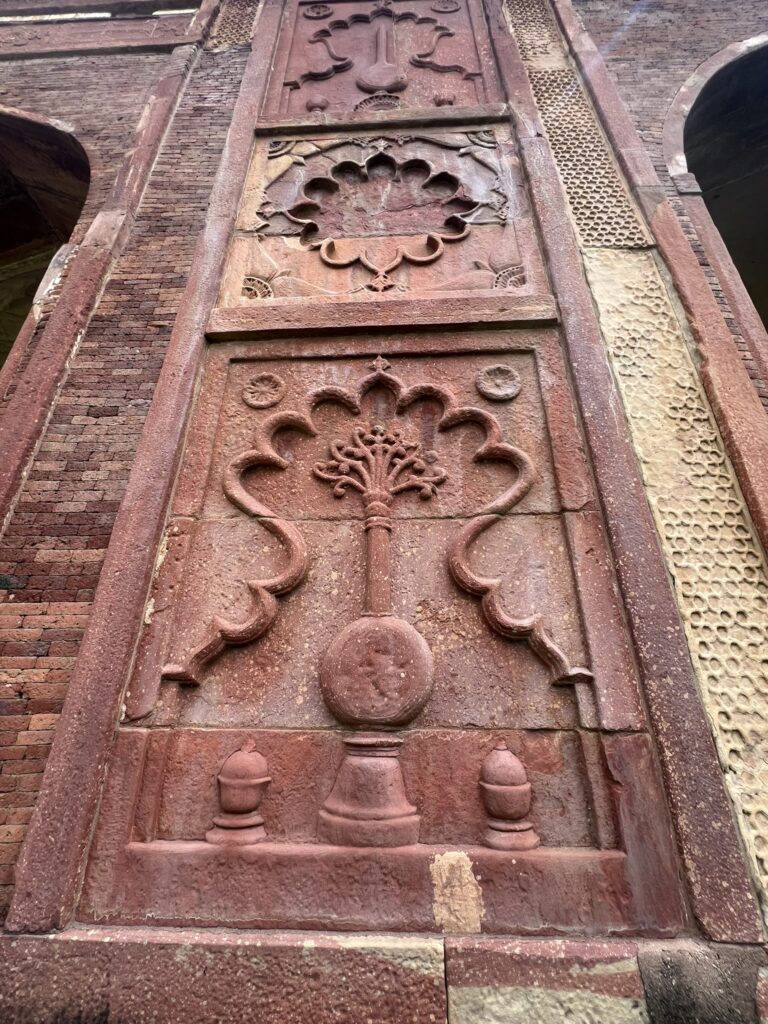 Tomb wall carvings.